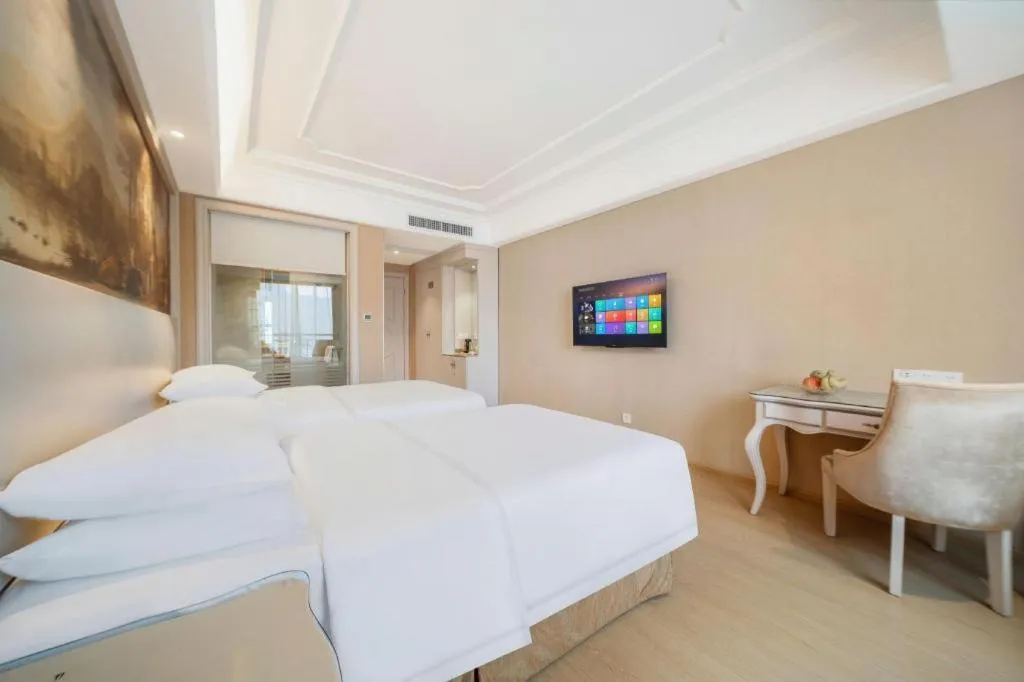 Bed in Vienna Hotel Guiyang Jiaxiulou Jichang Road