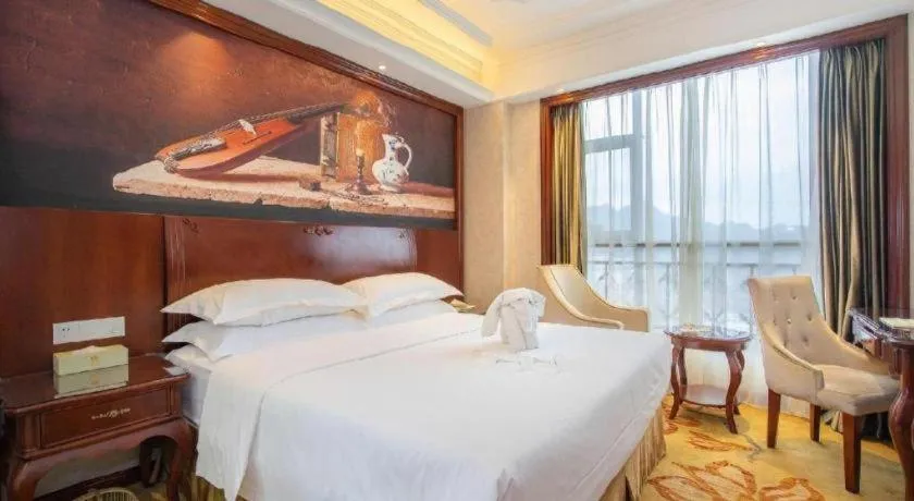 Bed in Vienna Hotel Guiyang Jiaxiulou Jichang Road