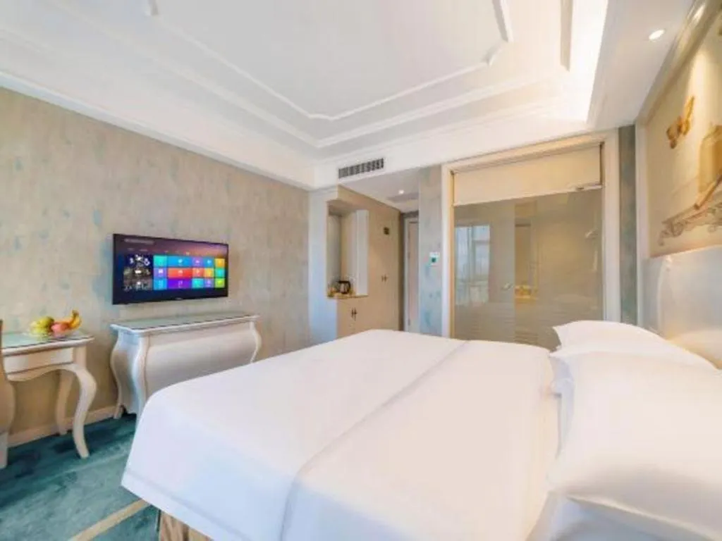 Bed in Vienna Hotel Guiyang Jiaxiulou Jichang Road