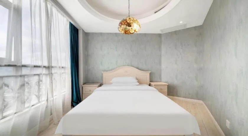 Bed in Vienna Hotel Guiyang Jiaxiulou Jichang Road