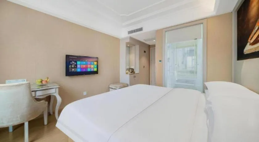 Bed in Vienna Hotel Guiyang Jiaxiulou Jichang Road