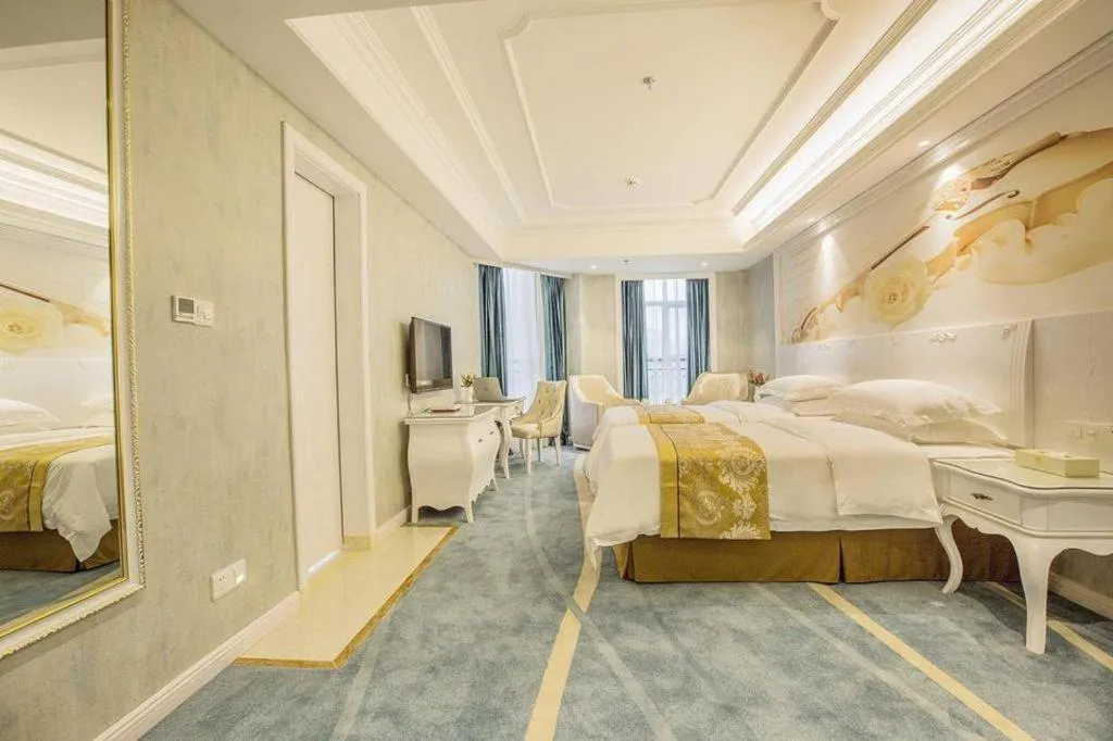 Bed in Vienna Hotel Guiyang Jiaxiulou Jichang Road