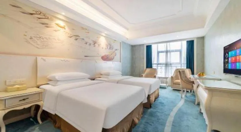 Bed in Vienna Hotel Guiyang Jiaxiulou Jichang Road