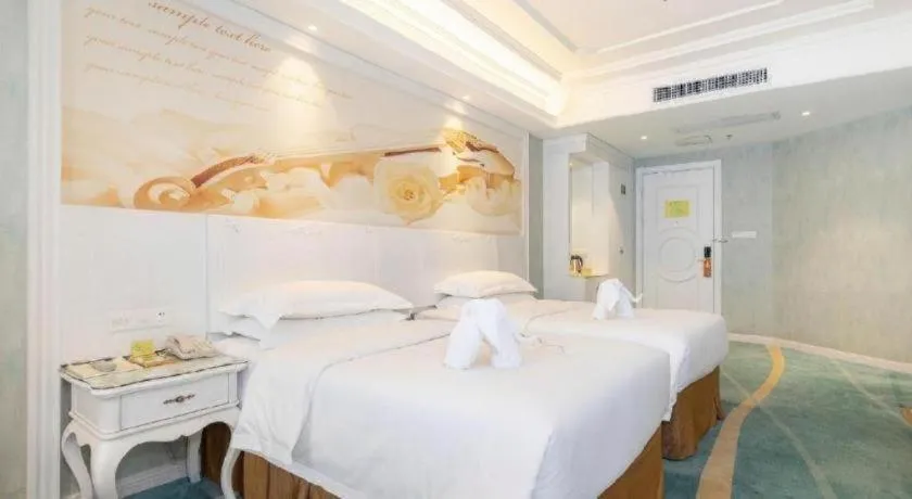 Bed in Vienna Hotel Guiyang Jiaxiulou Jichang Road