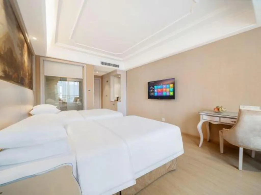 Bed in Vienna Hotel Guiyang Jiaxiulou Jichang Road