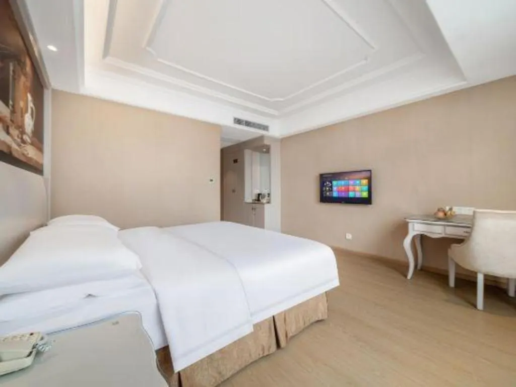Bed in Vienna Hotel Guiyang Jiaxiulou Jichang Road