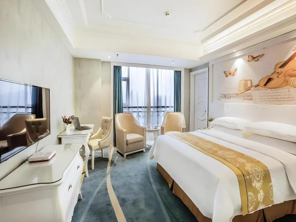 Bed in Vienna Hotel Guiyang Jiaxiulou Jichang Road