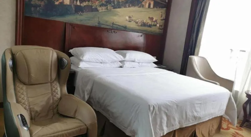 Bed in Vienna Hotel Guiyang Jiaxiulou Jichang Road
