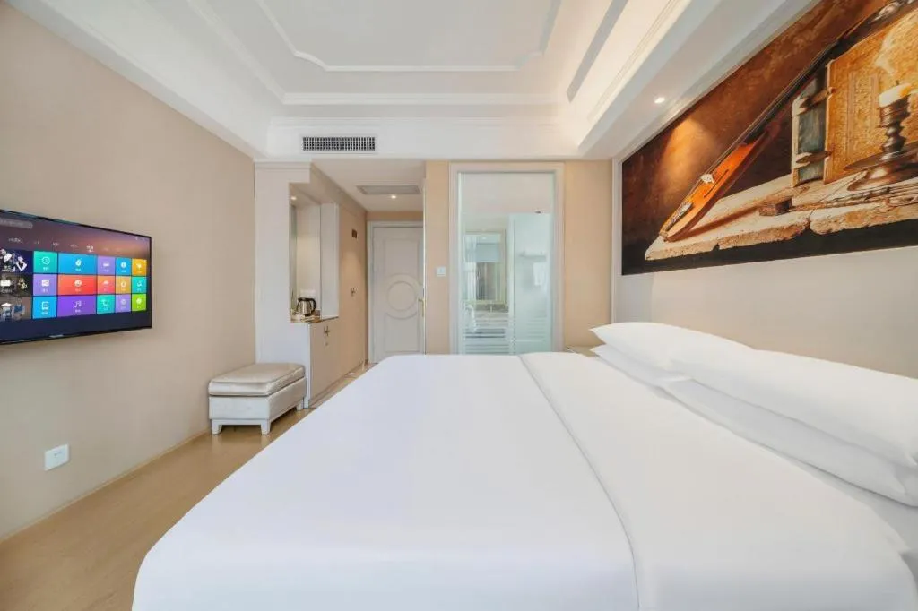 Bed in Vienna Hotel Guiyang Jiaxiulou Jichang Road