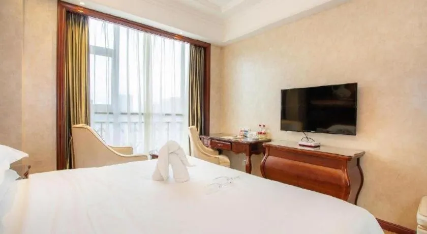 Bed in Vienna Hotel Guiyang Jiaxiulou Jichang Road