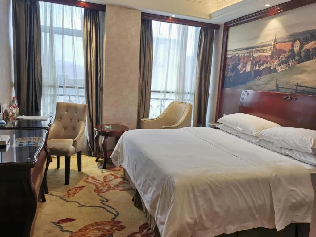 Bed in Vienna Hotel Guiyang Jiaxiulou Jichang Road