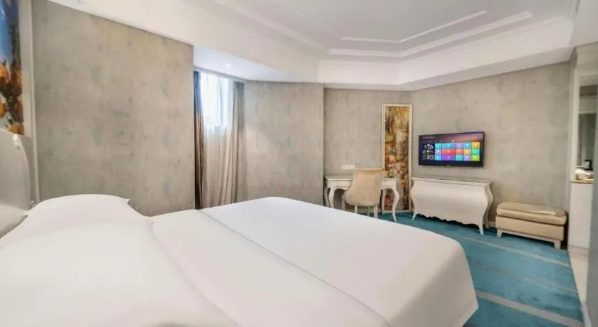 Bed in Vienna Hotel Guiyang Jiaxiulou Jichang Road