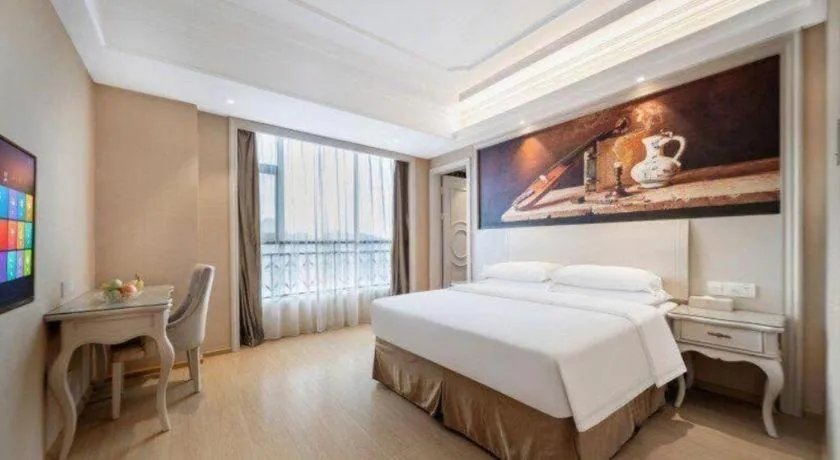 Bed in Vienna Hotel Guiyang Jiaxiulou Jichang Road