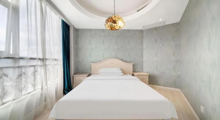 Bed in Vienna Hotel Guiyang Jiaxiulou Jichang Road