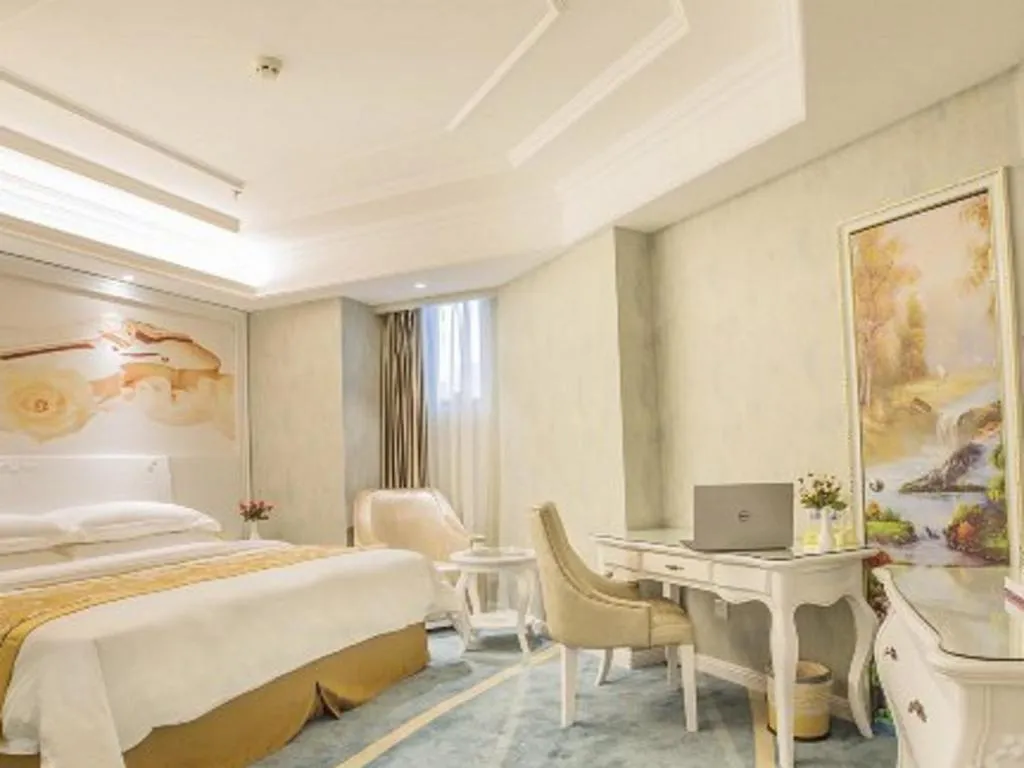 Bed in Vienna Hotel Guiyang Jiaxiulou Jichang Road