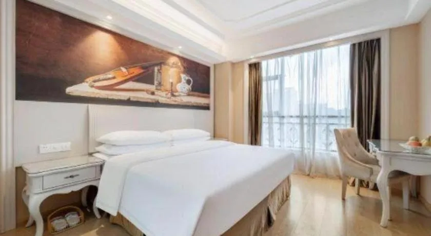 Bed in Vienna Hotel Guiyang Jiaxiulou Jichang Road