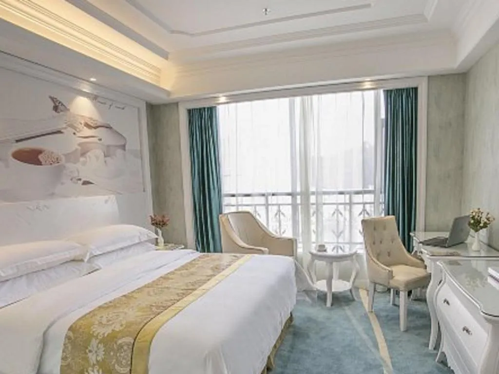 Bed in Vienna Hotel Guiyang Jiaxiulou Jichang Road