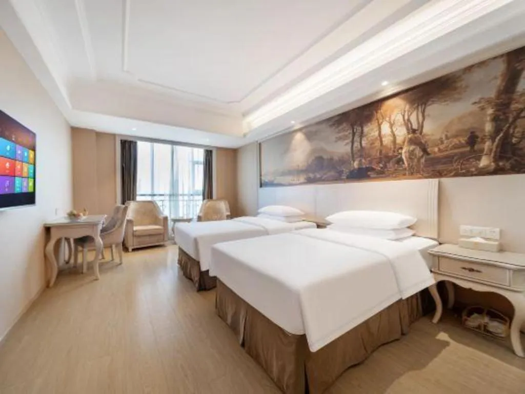 Bed in Vienna Hotel Guiyang Jiaxiulou Jichang Road