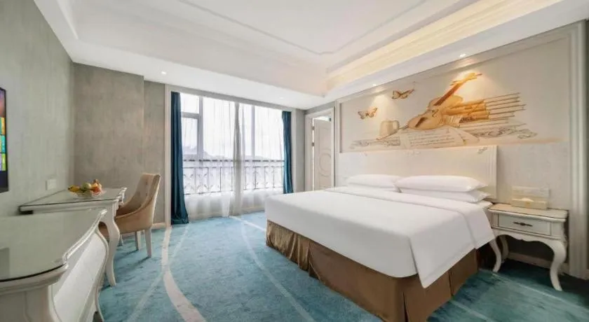 Bed in Vienna Hotel Guiyang Jiaxiulou Jichang Road