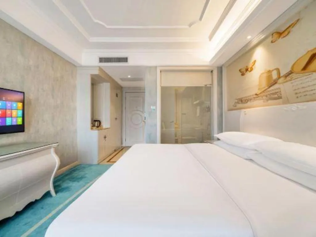 Bed in Vienna Hotel Guiyang Jiaxiulou Jichang Road