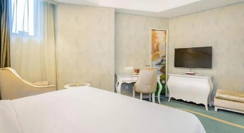 Bed in Vienna Hotel Guiyang Jiaxiulou Jichang Road