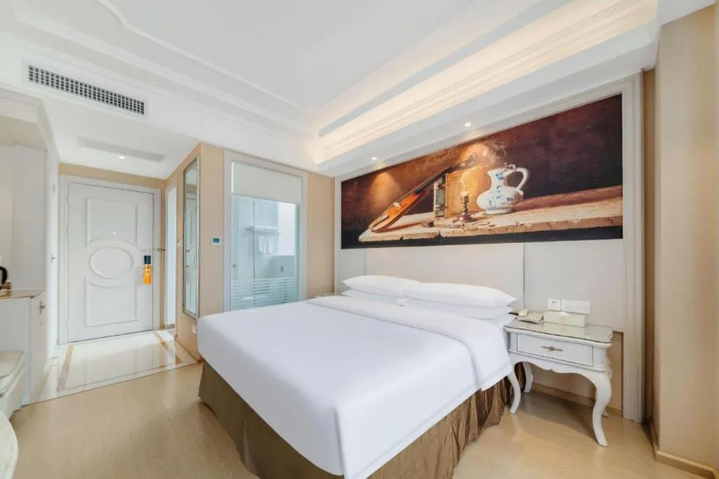 Bed in Vienna Hotel Guiyang Jiaxiulou Jichang Road