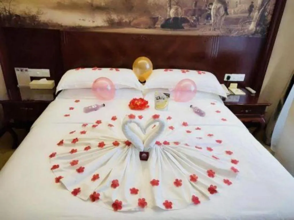 Bed in Vienna Hotel Guiyang Jiaxiulou Jichang Road