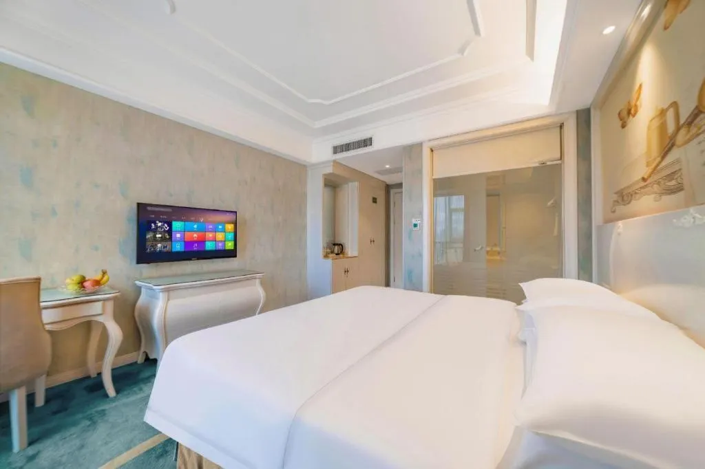 Bed in Vienna Hotel Guiyang Jiaxiulou Jichang Road