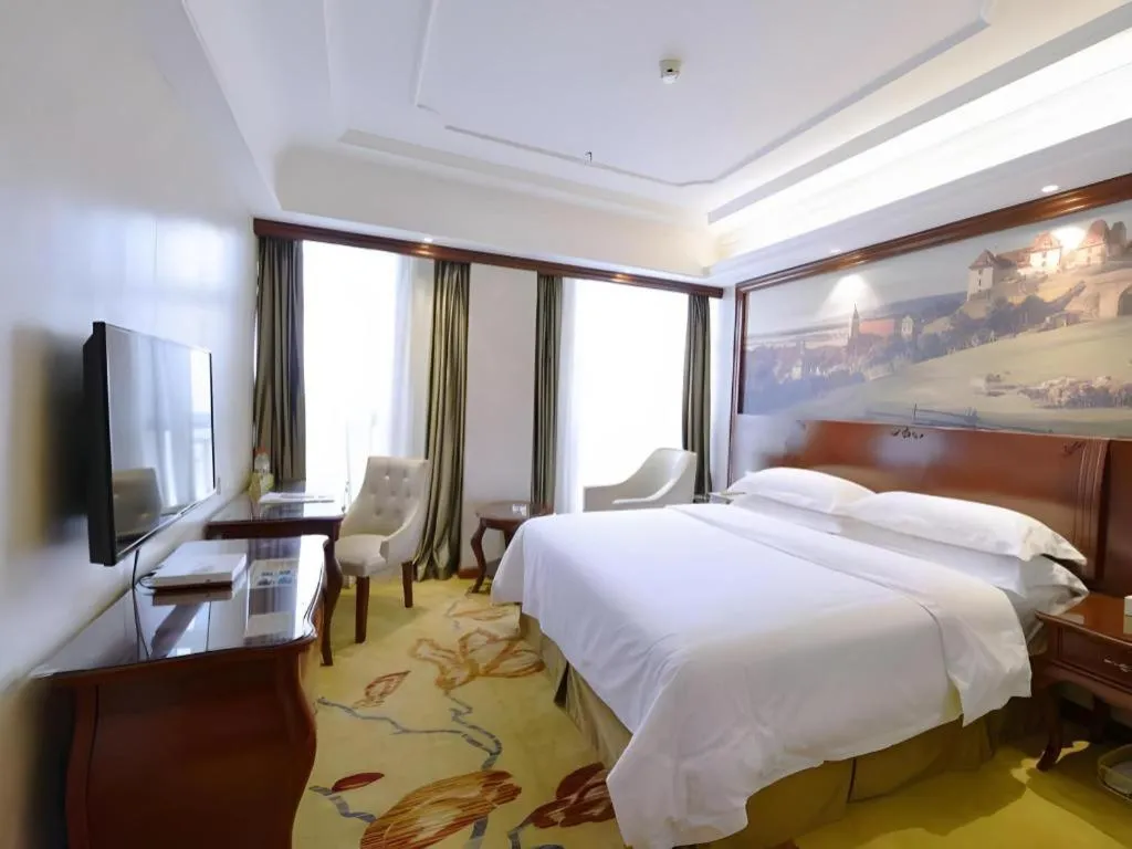 Bed in Vienna Hotel Guiyang Jiaxiulou Jichang Road