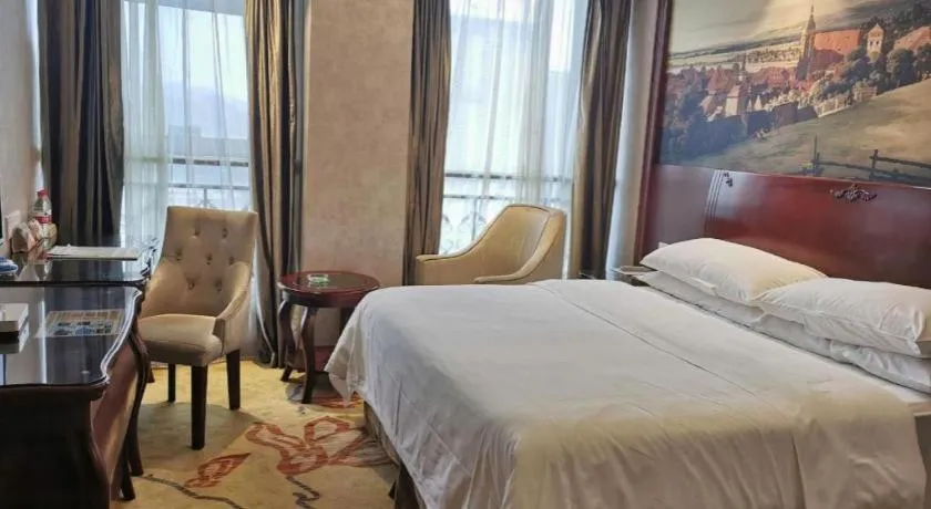 Bed in Vienna Hotel Guiyang Jiaxiulou Jichang Road