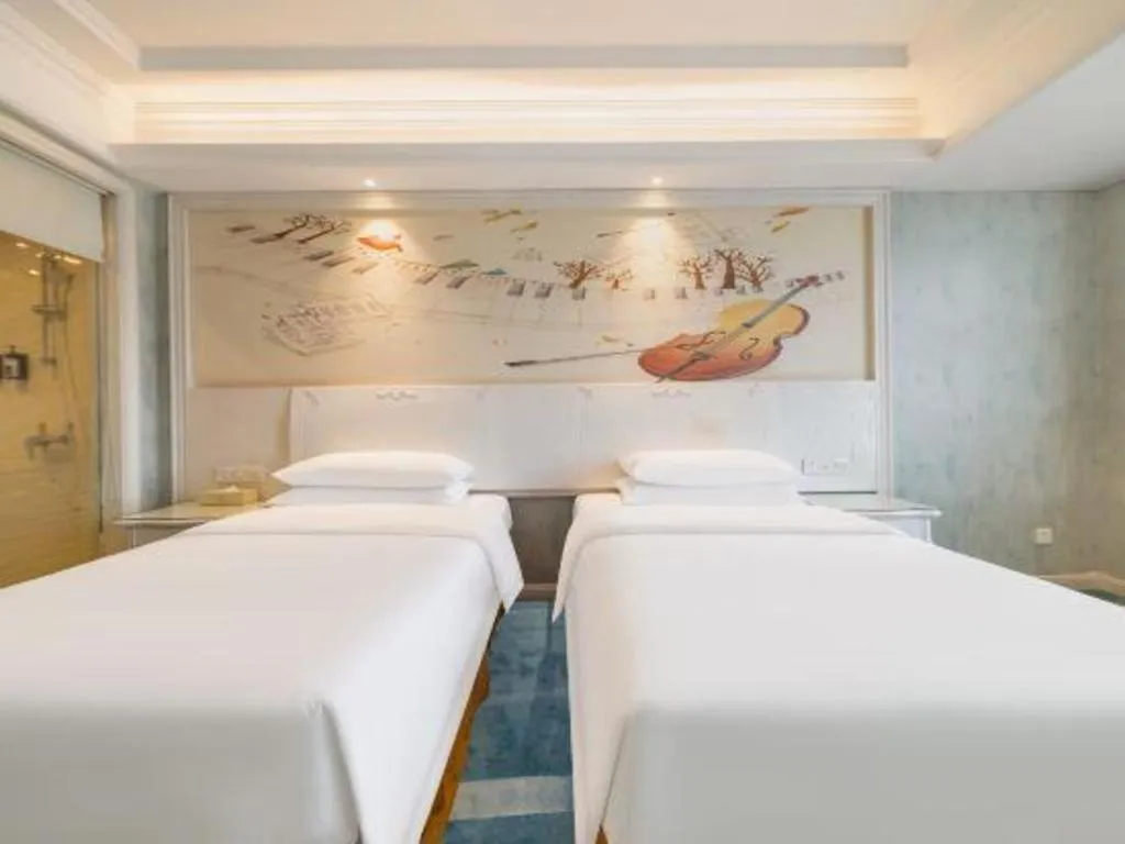 Bed in Vienna Hotel Guiyang Jiaxiulou Jichang Road