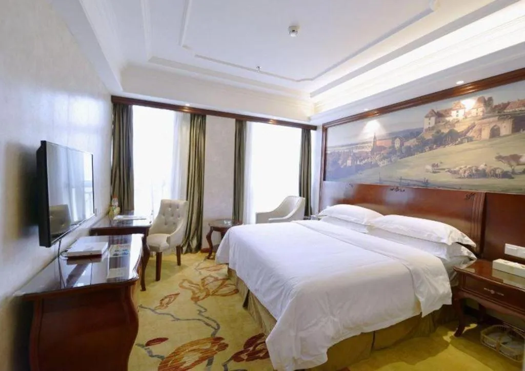Bed in Vienna Hotel Guiyang Jiaxiulou Jichang Road