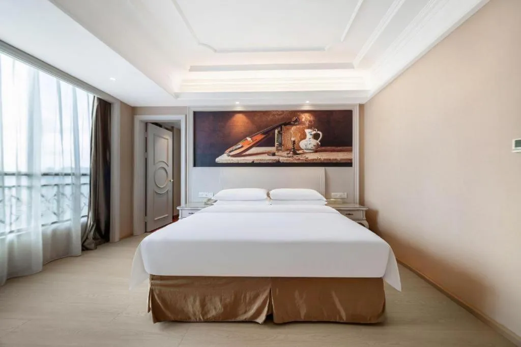 Bed in Vienna Hotel Guiyang Jiaxiulou Jichang Road