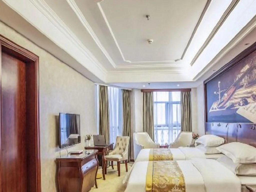 Bed in Vienna Hotel Guiyang Jiaxiulou Jichang Road