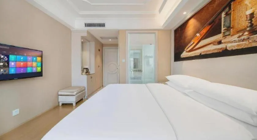 Bed in Vienna Hotel Guiyang Jiaxiulou Jichang Road