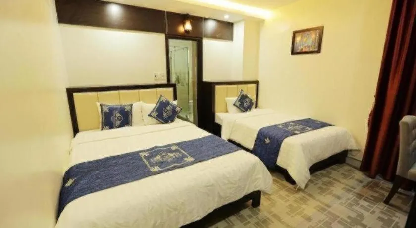 Bed in Tuong Minh Hotel