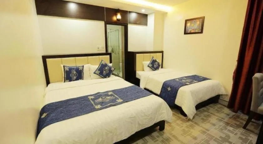 Bed in Tuong Minh Hotel