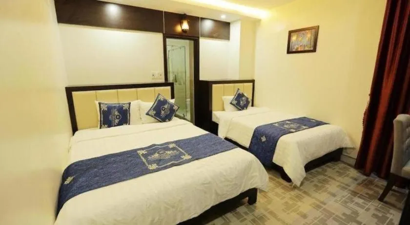 Bed in Tuong Minh Hotel