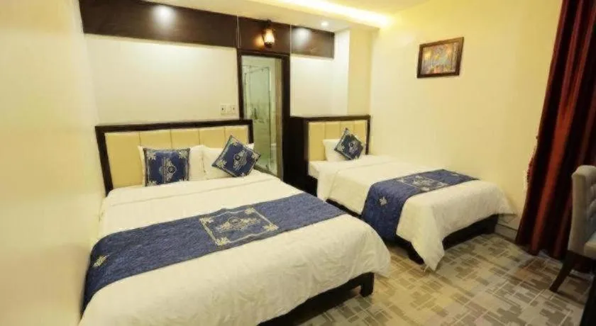 Bed in Tuong Minh Hotel