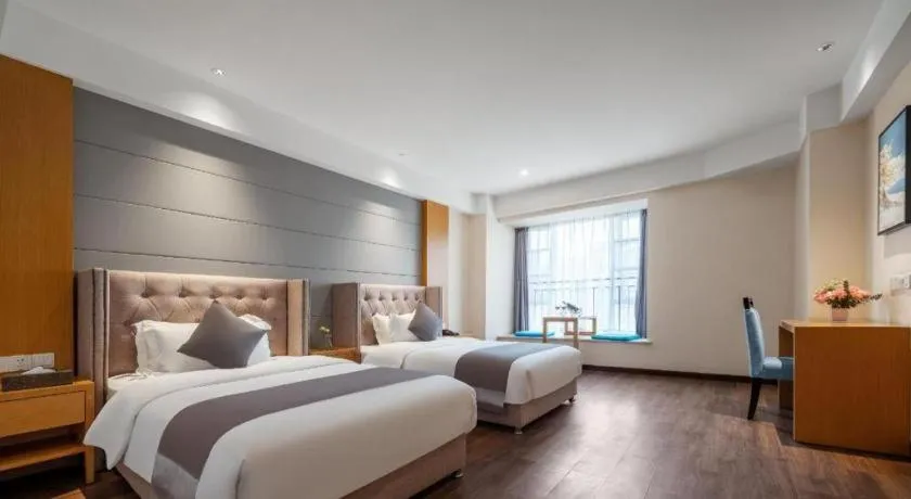 Bed in Xana Hotelle Chengdu East Railway Station Kaide Plaza