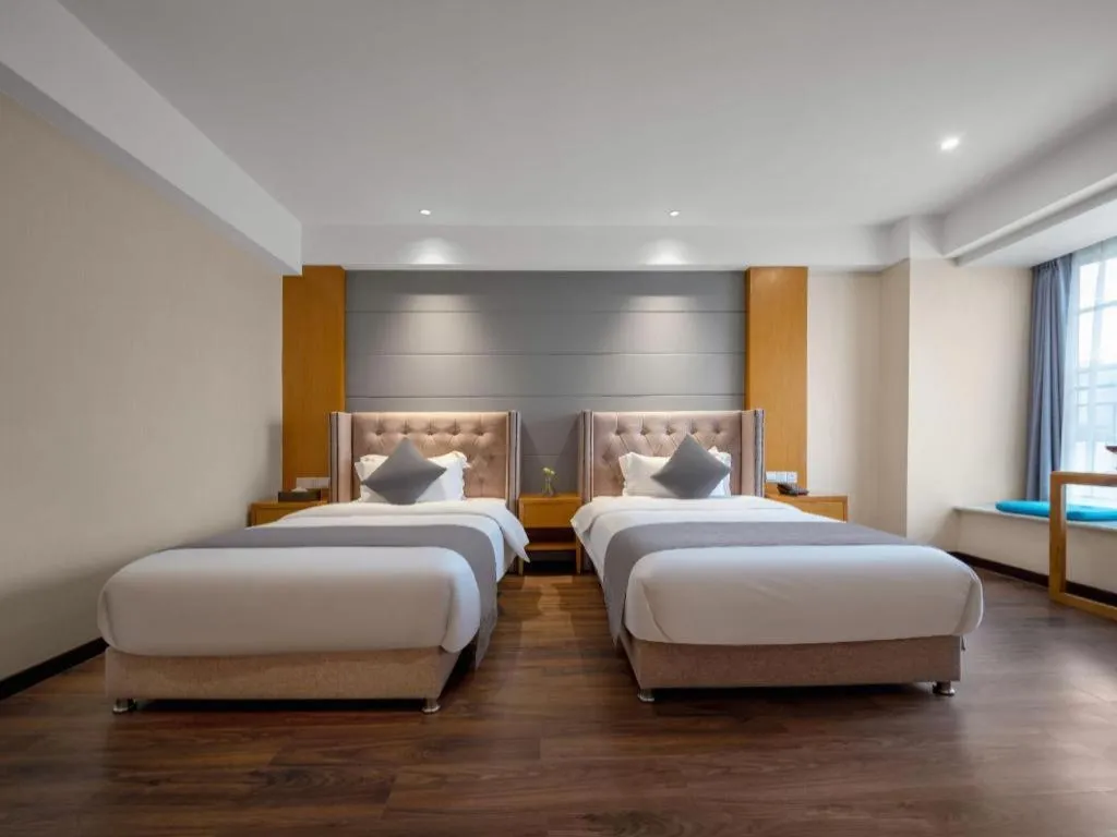 Bed in Xana Hotelle Chengdu East Railway Station Kaide Plaza