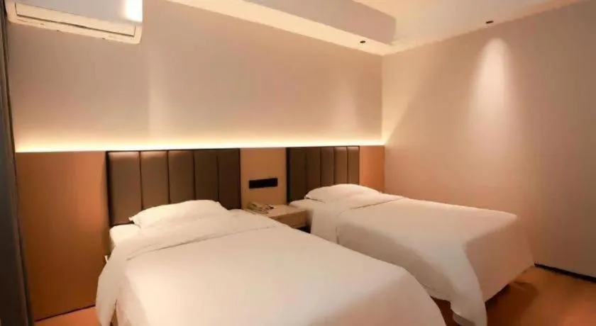 Bed in GreenTree Inn Maanshan Hanshan District Jiuwu Square Hotel