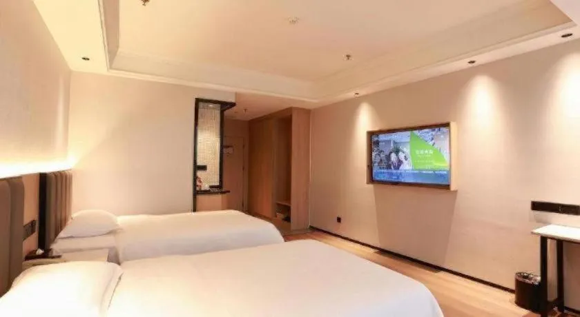 Bed in GreenTree Inn Maanshan Hanshan District Jiuwu Square Hotel