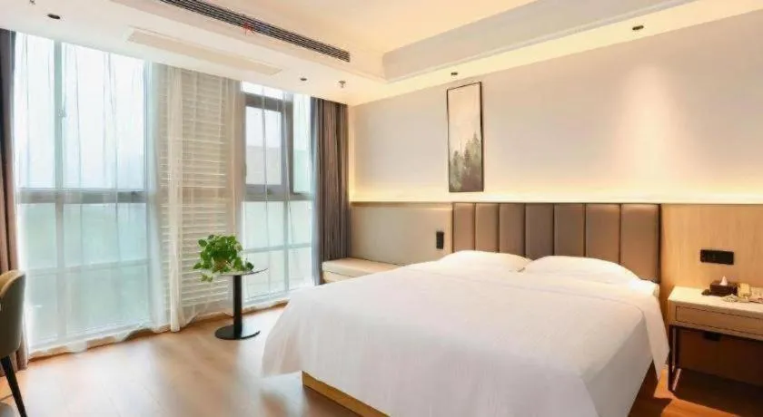 Bed in GreenTree Inn Maanshan Hanshan District Jiuwu Square Hotel