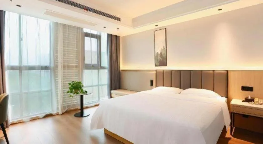 Bed in GreenTree Inn Maanshan Hanshan District Jiuwu Square Hotel