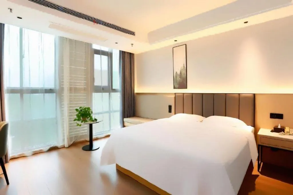 Bed in GreenTree Inn Maanshan Hanshan District Jiuwu Square Hotel