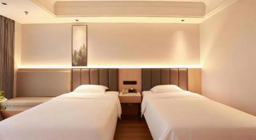 Bed in GreenTree Inn Maanshan Hanshan District Jiuwu Square Hotel