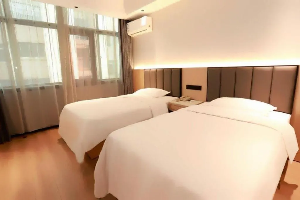Bed in GreenTree Inn Maanshan Hanshan District Jiuwu Square Hotel