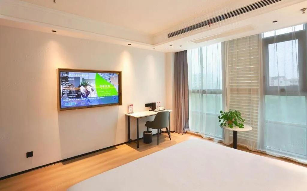 Bed in GreenTree Inn Maanshan Hanshan District Jiuwu Square Hotel