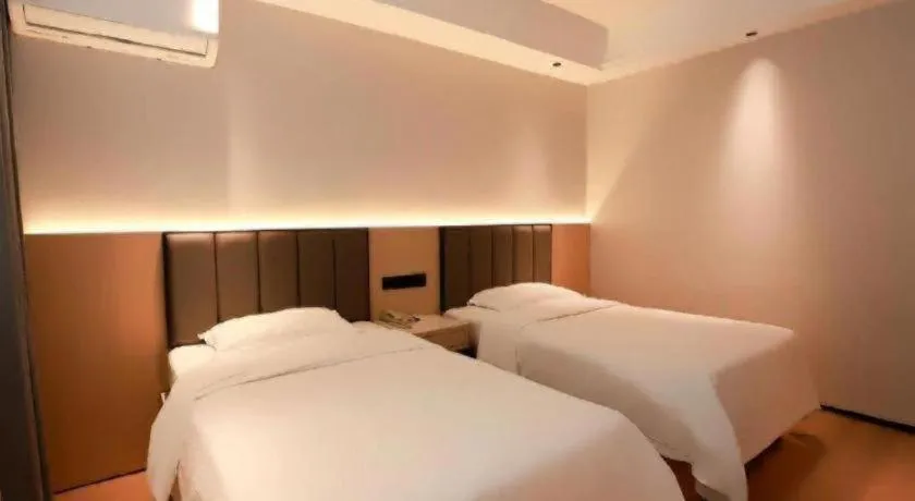 Bed in GreenTree Inn Maanshan Hanshan District Jiuwu Square Hotel
